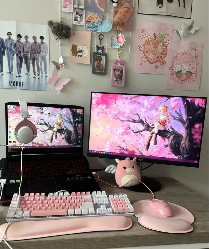 two computer monitors sitting next to each other on top of a desk with mouse and keyboard