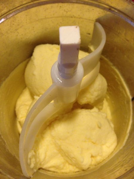 a blender filled with yellow batter on top of a counter