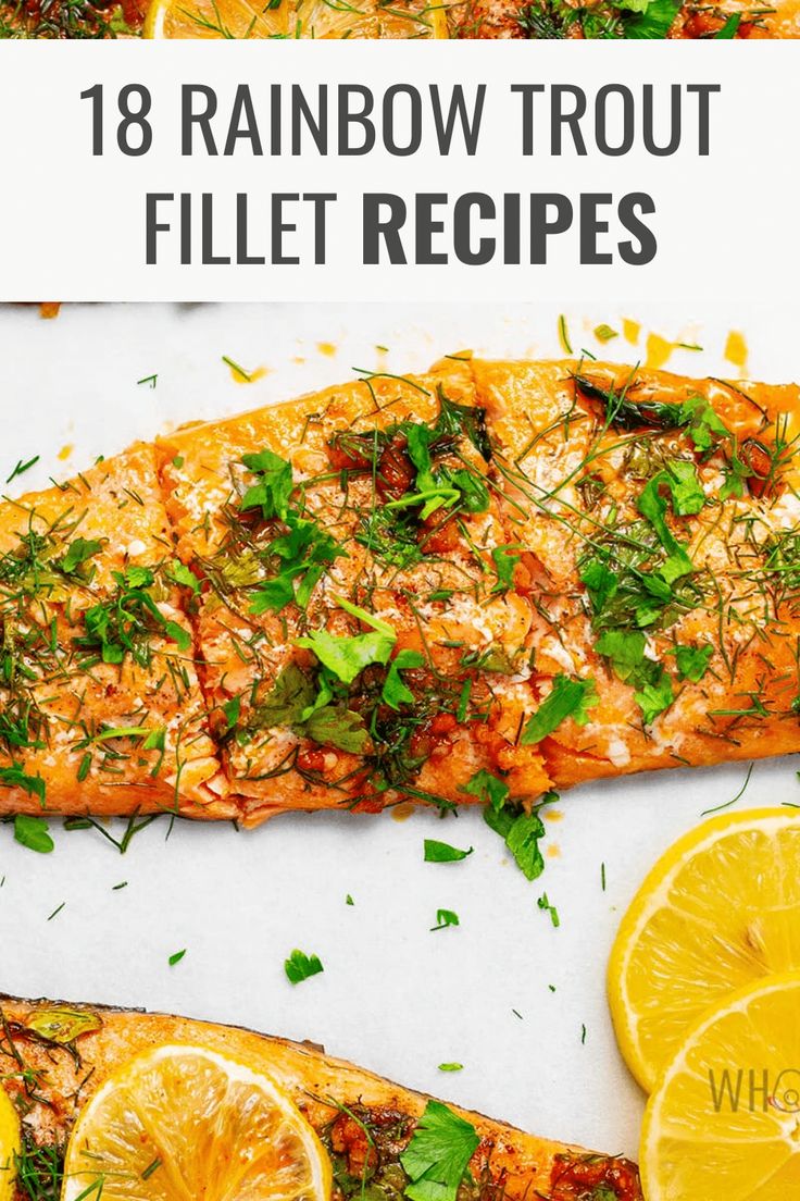 rainbow trout fillet recipe with lemons and herbs on the side in front of it