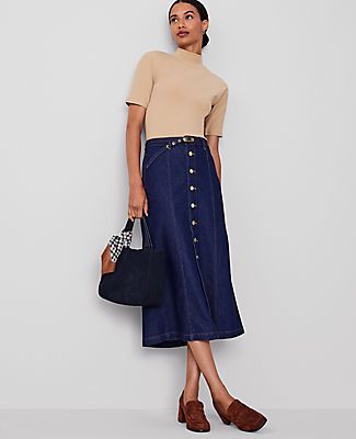 Dark denim takes a tailored turn with this polished button front skirt. Self-tie buckle belt. Button front. Vertical on-seam pockets.,Hit:Hits at ankle,Imported:Imported,Length:34" long,Fabrication:76% Cotton, 23% Lyocell, 1% Spandex,Garment Care:Machine Washable Denim Boot Skirt in Classic Rinse by Ann Taylor Size regular - 14 Classic Rinse Wash Women's Cotton, Blend, Pencil, Skirts, 76%, Cotton, 23%, Lyocell, 1%, Spandex, Machine, Washable Denim Skirt Midi, Trendy Knee-length Relaxed Denim Skirt, Casual Knee-length Buttoned Denim Skirt, Chic Knee-length Lined Denim Skirt, Non-stretch Denim Knee-length Skirt, Knee-length Relaxed Denim Skirt With Lining, Knee Length Jean Skirts, Button Front Skirt, Denim Boots