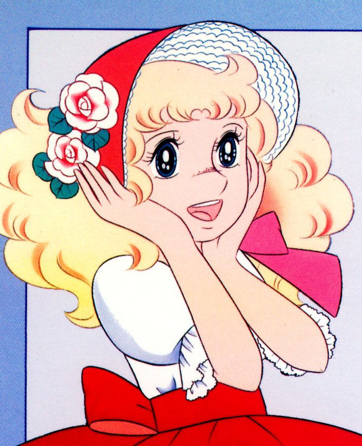 a woman with blonde hair and a red hat holding her hand up to her face