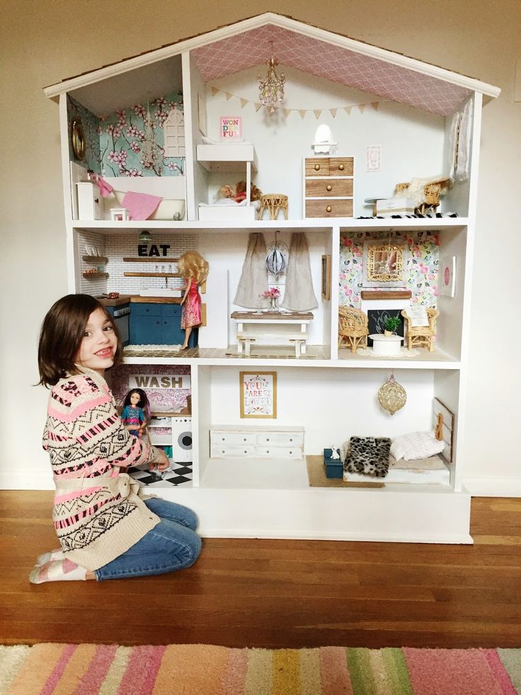 For the past few months, Tim and I have been working hard on a secret Christmas project for Peyton. She had been asking for a dollhouse f... Doll House For Barbie, Shelf Doll House Diy, Diy Barbie Storage Ideas, Dollhouse Bookshelf Diy, Barbie House Plans, Barbie Dollhouse Diy, Barbie Furniture Diy Homemade, Barbie Shelf, Barbie Storage Ideas