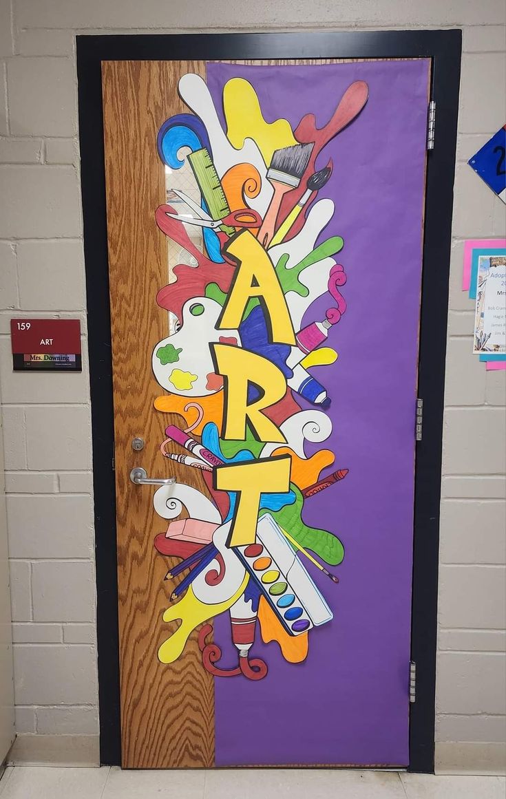 a door decorated with colorful letters and scissors