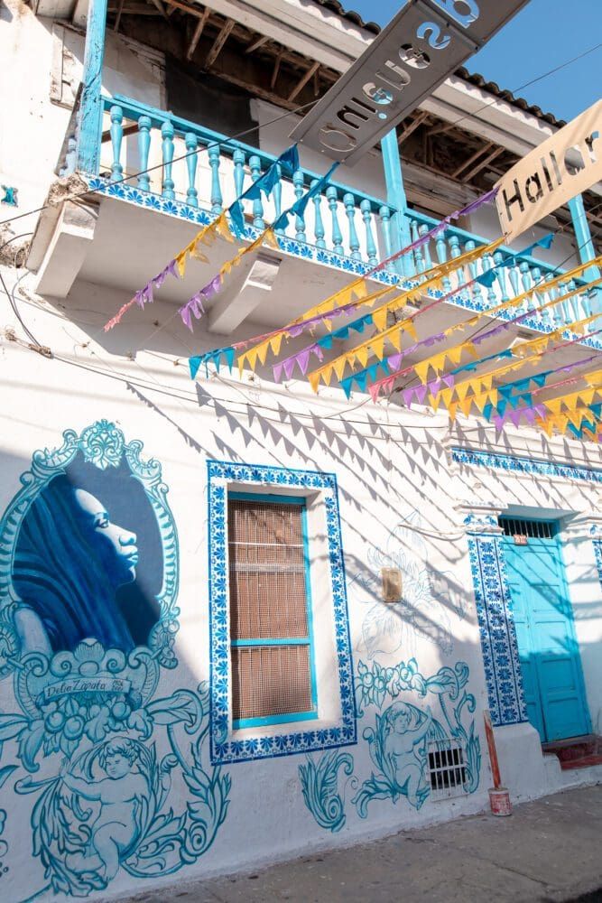 a building with blue and white painted on it