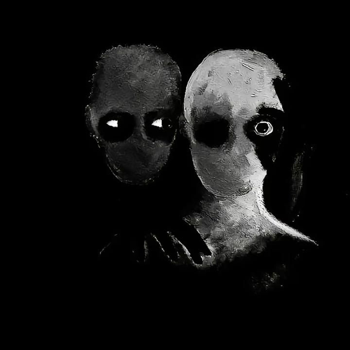 two alien like people standing next to each other on a black background with one staring at the camera