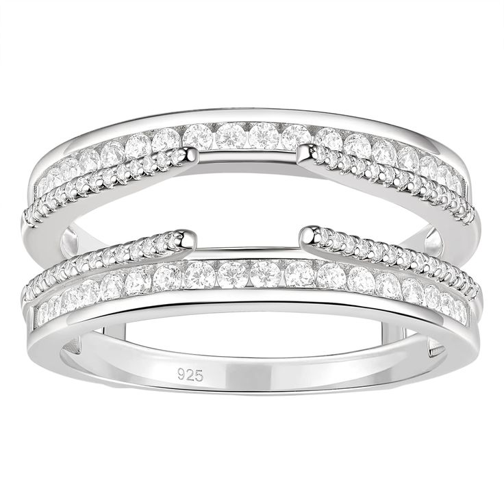 two white gold rings with diamonds on each band