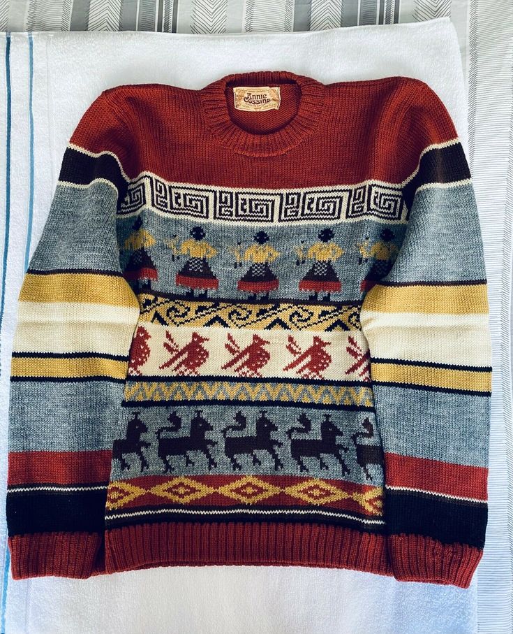 an ugly sweater hanging on a clothes rack