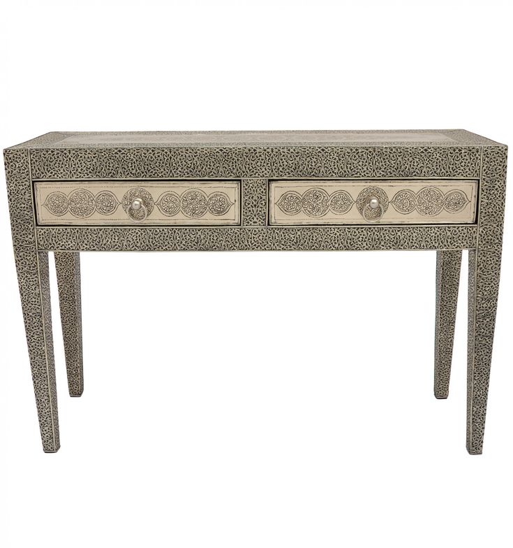 an ornately decorated console table with two drawers on one side and three smaller drawers on the other