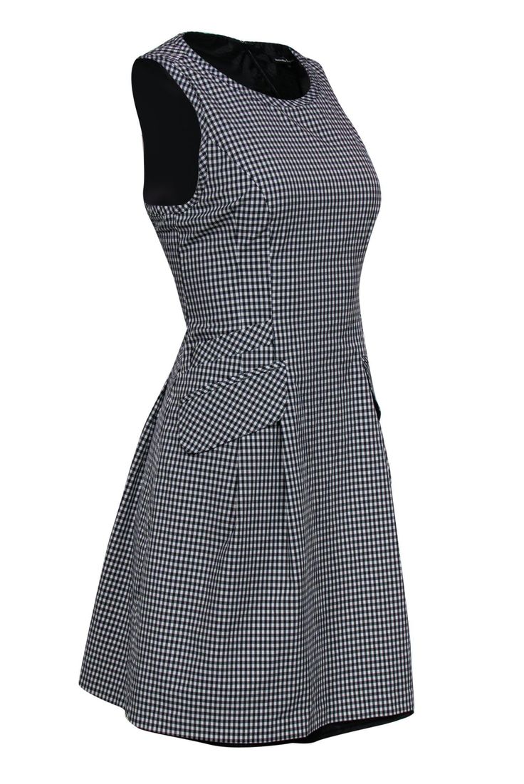 Go for a classic springtime look with this gorgeously gingham frock! Perfect for wearing with espadrille flats or your favorite sandals when you want some light and girly style for those sunny days. Size 10 59% Polyamide, 41% Nylon Tent, shift silhouette Rounded neckline Pockets at hip Zippered back Fully lined Waist 32" Bust 34" Total length 35" Casual Plaid Dress For Spring Picnic, Casual A-line Plaid Dress, Black Plaid Dress For Work In Spring, Casual Gingham Plaid Dress For Spring, Preppy Spring Workwear Dresses, Fitted Preppy Plaid Dress For Spring, Summer Black Plaid Dress, Spring A-line Plaid Dress, Casual Fitted Houndstooth Dress