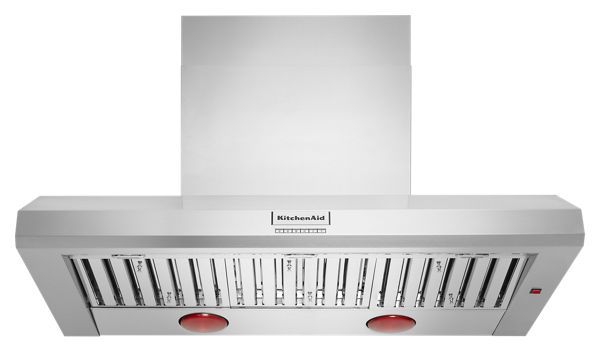 a stainless steel range hood with red knobs