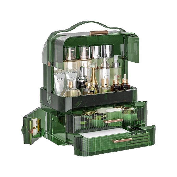 an open green cosmetic case filled with lots of bottles and other items on top of it