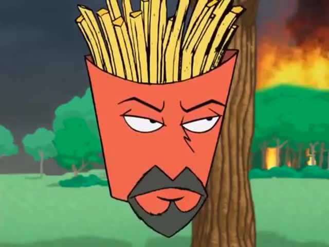 a cartoon character with a red face and beard wearing french fries in front of a tree