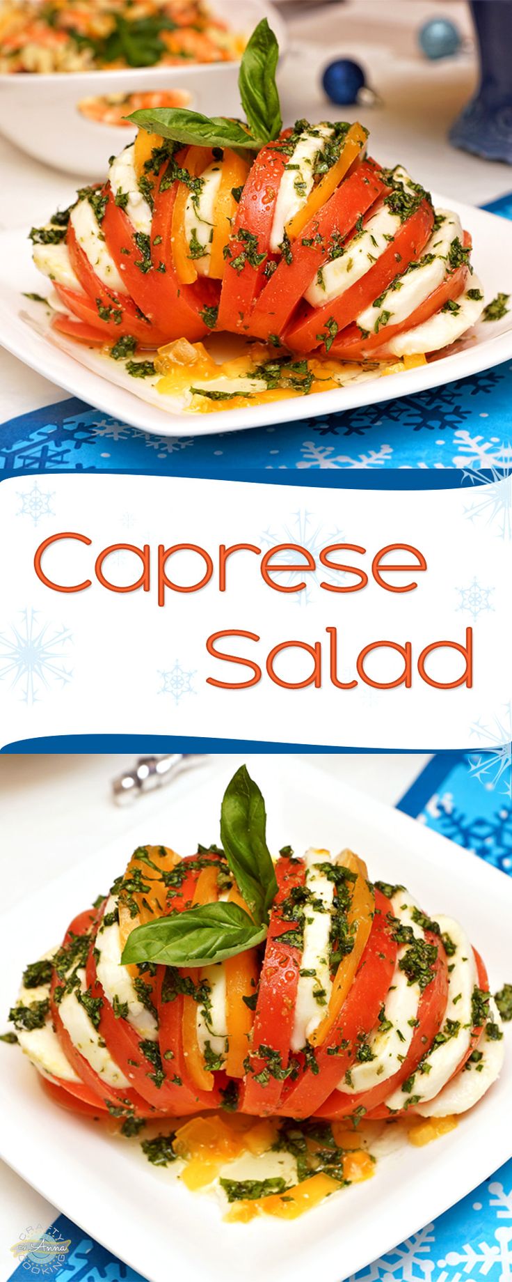 caprese salad with tomatoes, mozzarella and basil on white plate over blue table cloth