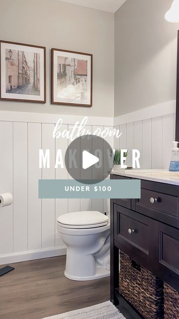 a bathroom with pictures on the wall and a toilet in the middle, under $ 10 00