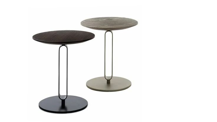 two round tables with metal legs and wood top, one in black and the other in white