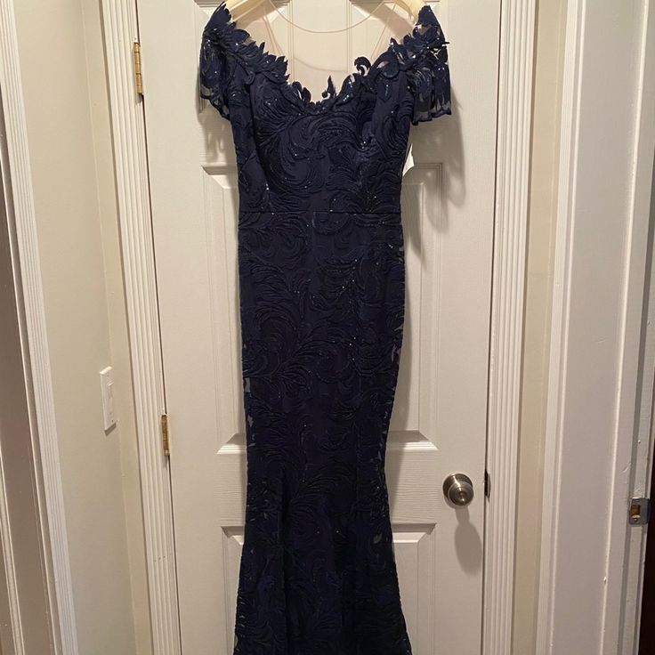 Off The Shoulder, Trumpet Style Dress Navy Blue Lace Sequin Detail Nwt Nicole Bakti Designer Beautiful For A Wedding Mother Of The Bride Or Mother Of The Groom Dress Formal Gown, Gala Dress, Black Tie Wedding Dress Blue Mother Of The Bride Dress With Sweetheart Neckline, Blue Fitted Mother Of The Bride Dress For Gala, Blue Lace Mother Of The Bride Dress For Wedding, Blue Lace Mother Of The Bride Dress, Elegant Blue Mother Of The Bride Dress For Gala, Blue Lace Evening Dress For Formal Occasions, Formal Blue Lace Evening Dress, Blue Lace Gown For Formal Occasions, Elegant Blue Wedding Gown