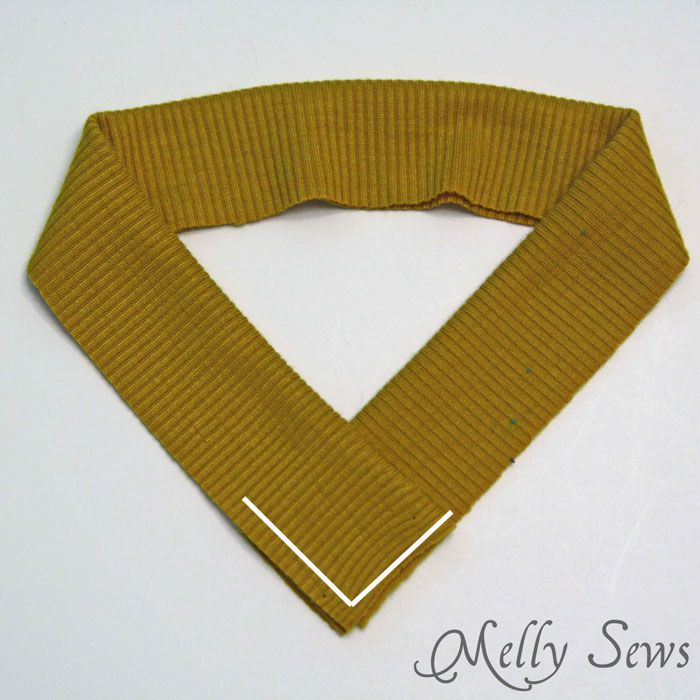 an image of a neck tie made out of fabric on a white surface with the words melly sews written below it