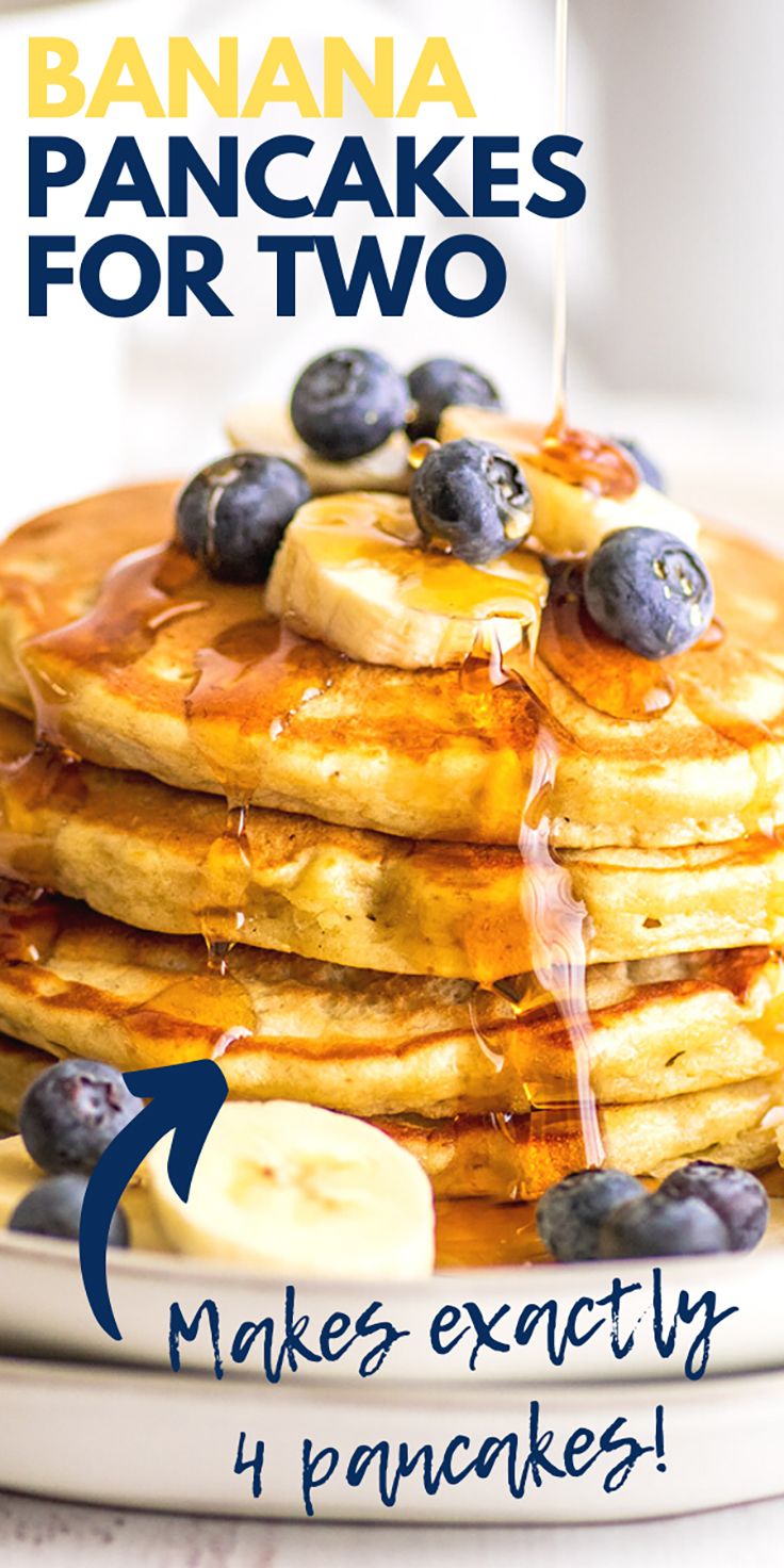 pancakes with blueberries and bananas are stacked on top of each other in front of the caption, make exactly pancakes