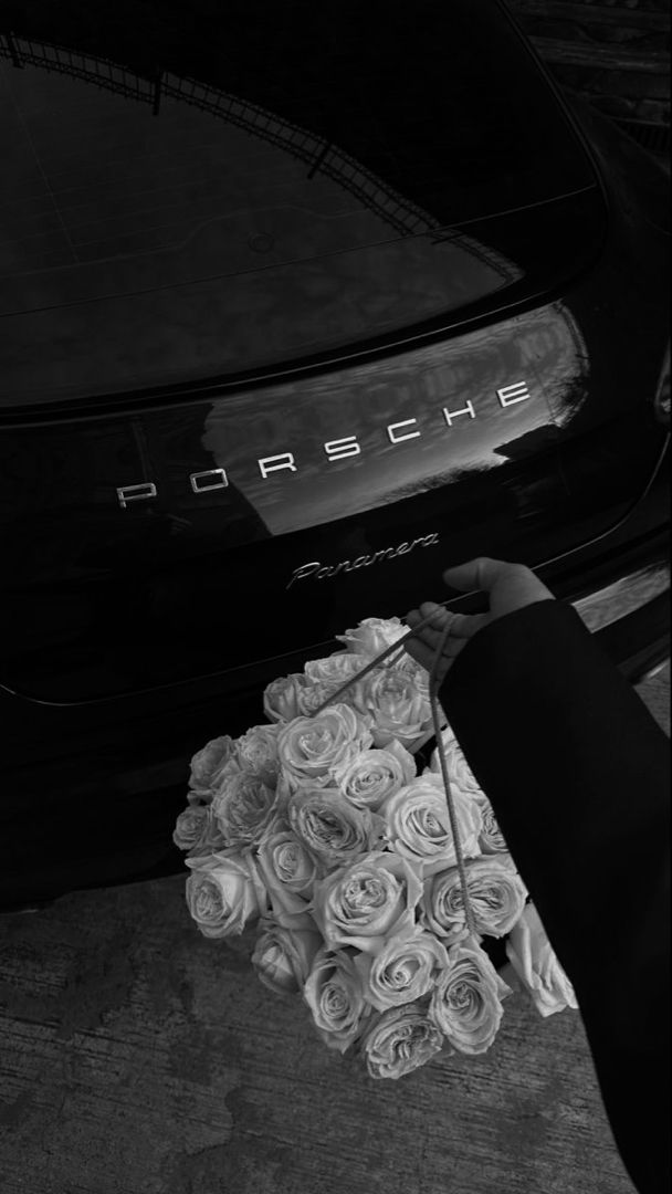 porsche , flowers , porsche aesthetic , car wallpaper , car , porsche panamera , black and white , black and white aesthetic , black and white wallpaper , black car , flowers aesthetic , bouquet , photography Black Porsche, Black And White Photo Wall, Dark Feminine Aesthetic, Rich Lifestyle, Gray Aesthetic, Luxury Lifestyle Dreams, Classy Aesthetic, Luxury Aesthetic, Classy Cars