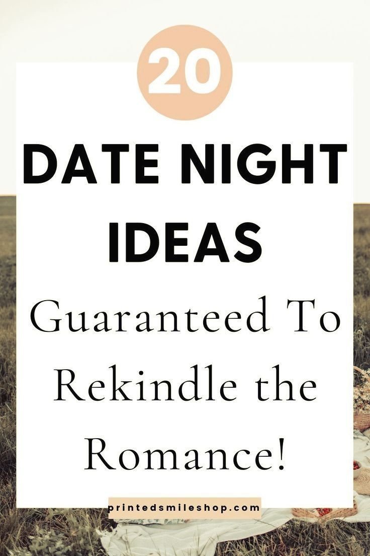 a white sign that says date night ideas, surrounded by grass and flowers in the background