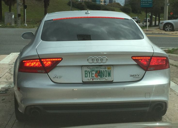 an audi car parked on the side of the road