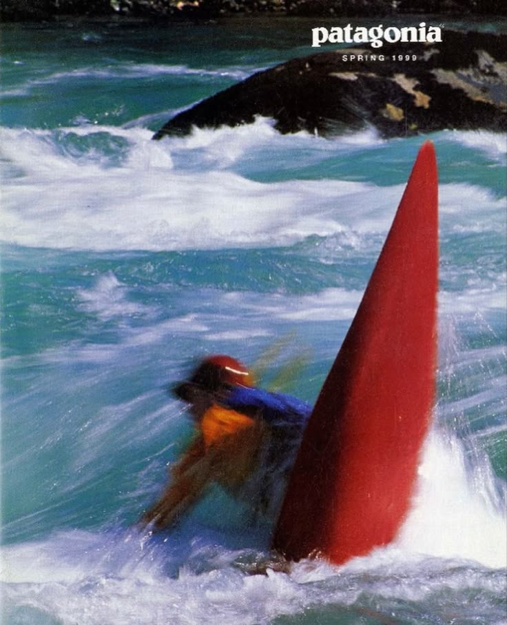 a man riding a surfboard on top of a wave