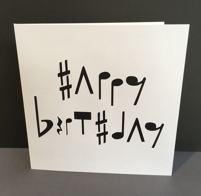 a birthday card with the words happy birthday written in black ink on white cardstock