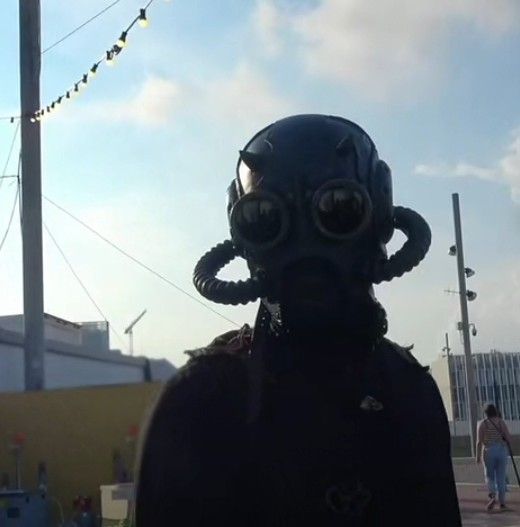 a person wearing a gas mask and goggles