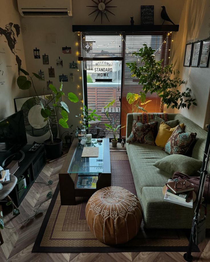 a living room filled with furniture and a flat screen tv