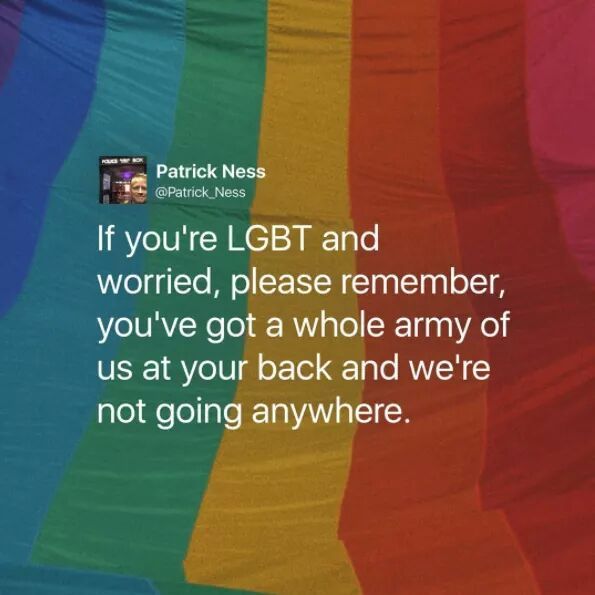 a rainbow colored background with the quote if you're lgbt and worried, please remember, you've got a whole army of us at your back and we're not going anywhere