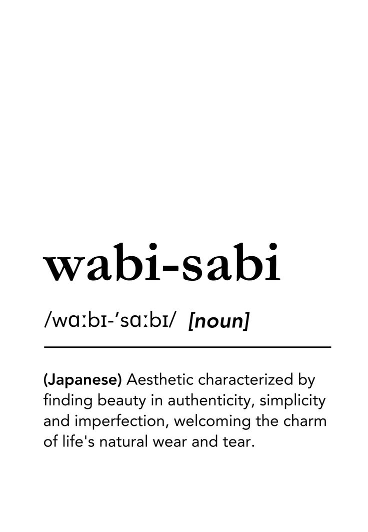 the words wabi - sabi are written in black and white, with an image of