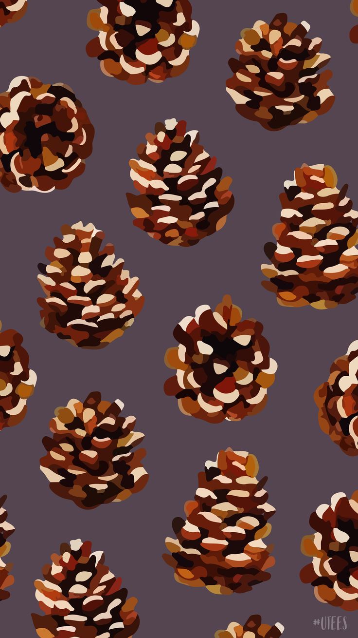 an image of pine cones on a purple background with brown and white dots in the middle