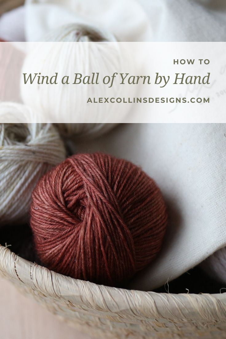 yarn in a basket with text overlay saying how to wind a ball of yarn by hand