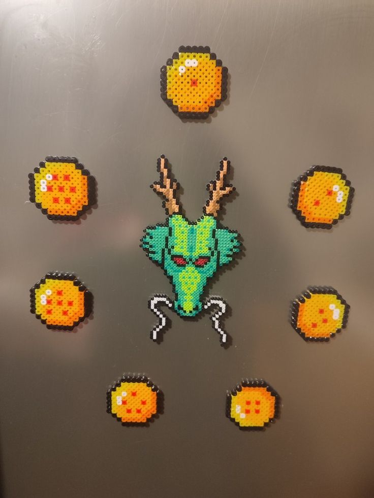 an image of some pixel art on a refrigerator