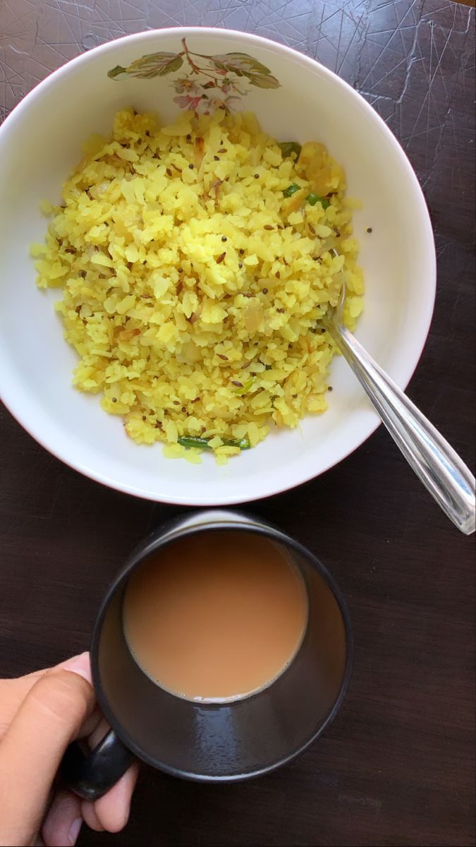 a bowl of rice and a cup of tea