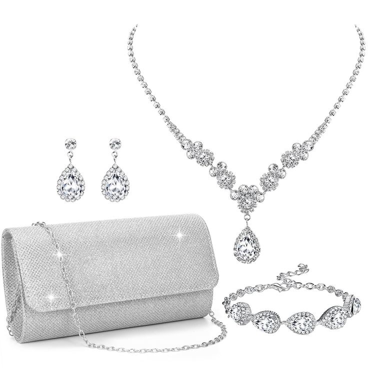 PRICES MAY VARY. PROM JEWELRY SETS SILVER: Silver jewelry set has 4 items, including a silver clutch, rhinestone bracelet, silver necklace and earring set. Silver prom jewelry set makes you elegant and fashionable, creating your own style. The shiny appearance of the crystal jewelry set allows you to stand out in crowds anytime, anywhere. The silver prom accessories will be a crucial step on your fashion path COSTUME JEWELRY FOR WOMEN: Rhinestone accessories for women is made of quality material Jewelry For Prom, Silver Prom Jewelry, Rhinestone Accessories, Prom Necklace, Prom Jewelry Sets, Prom Purse, Prom Necklaces, Prom Accessories, Bridal Accessories Jewelry