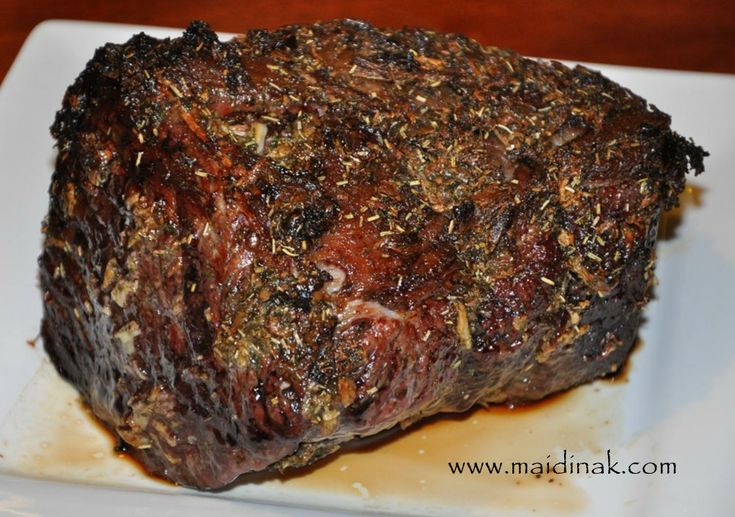 a close up of a steak on a plate