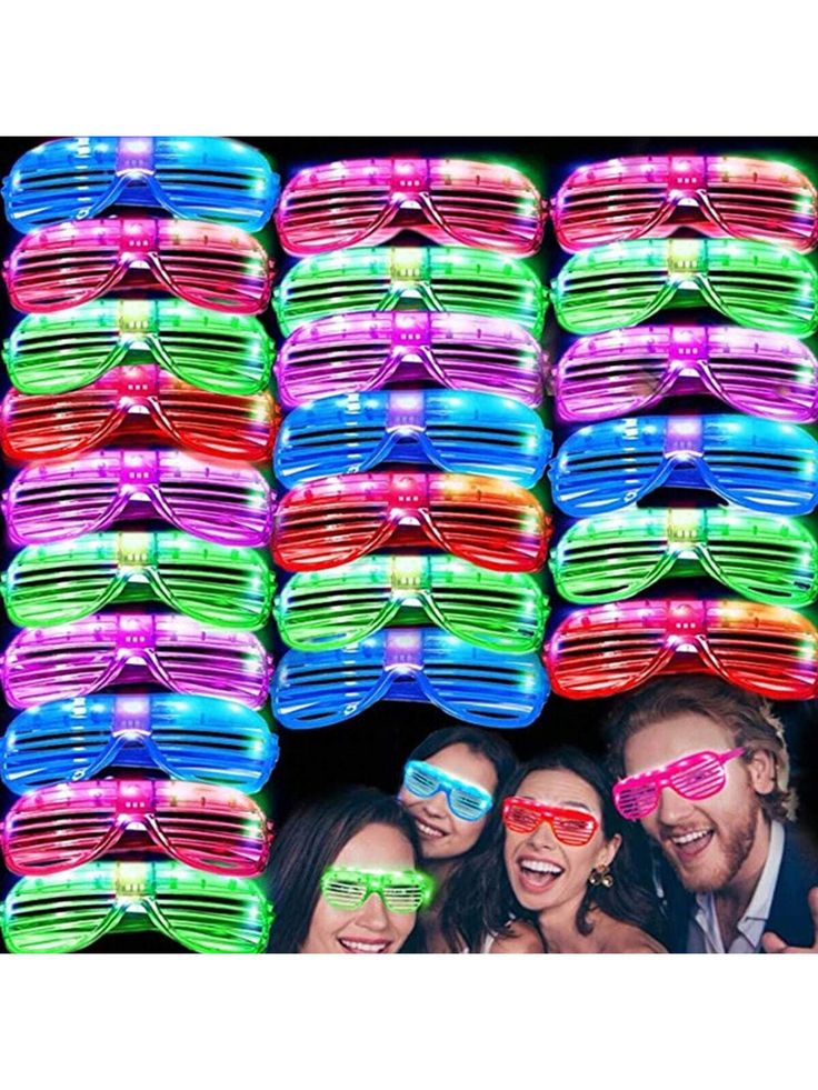 a group of people standing next to each other wearing neon glasses