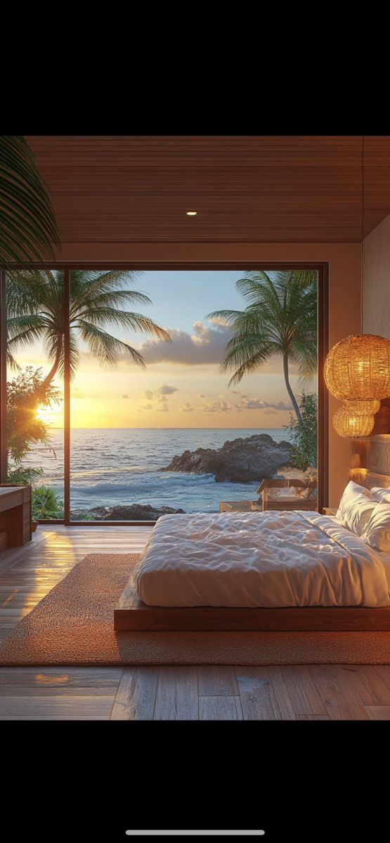 a bedroom with an ocean view is shown