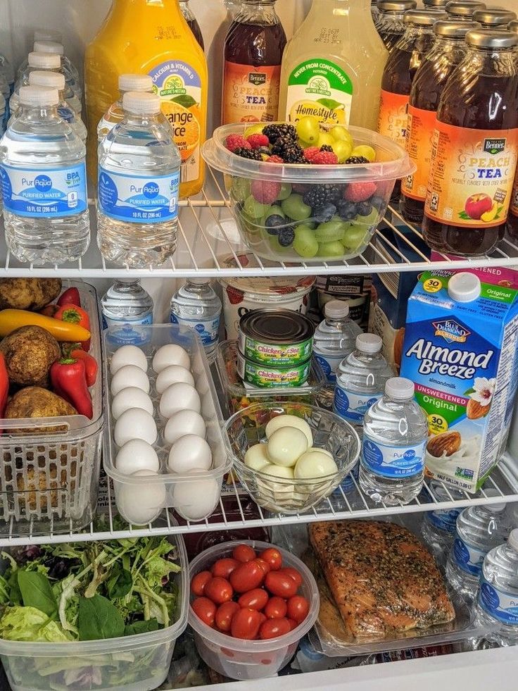 an open refrigerator filled with lots of food