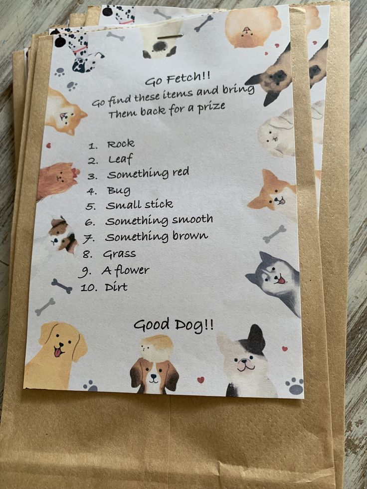 a brown paper bag with dogs and words on it sitting on top of a wooden floor