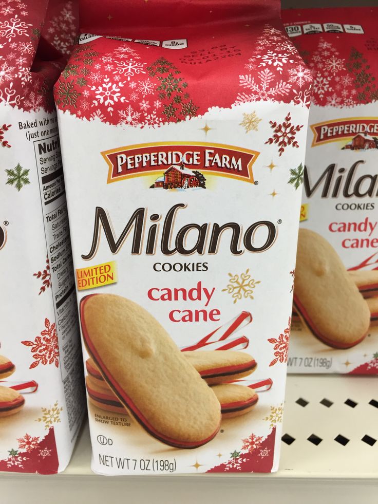 three packages of pepperidge farm's milano cookies are on display in a store