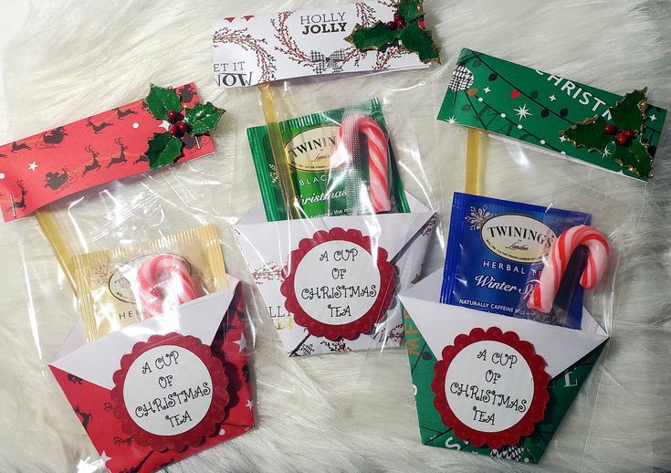 candy canes and candy wrappers are wrapped in cellophane to give as gifts