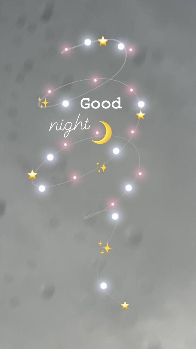 the words good night are written in white and yellow stars on a gray sky background