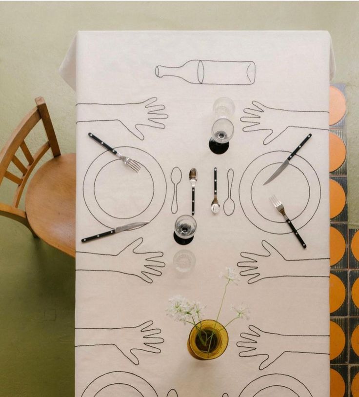 an overhead view of a table with utensils on it