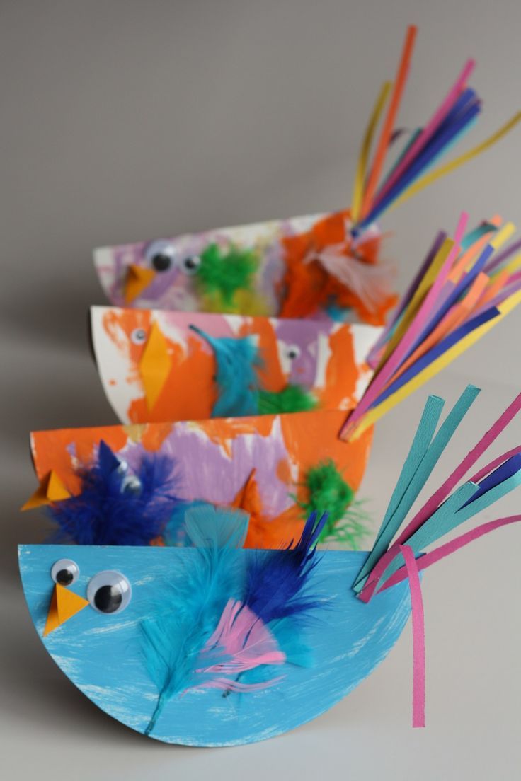 paper plate crafts with colorful feathers and birds on them for kids to make in the classroom