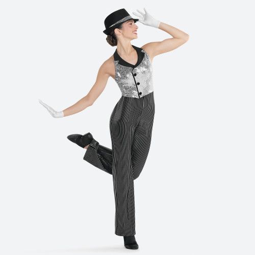 a woman in black and white is dancing