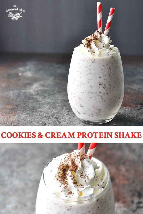 two shots of cookies and cream protein shake with candy canes in the top one