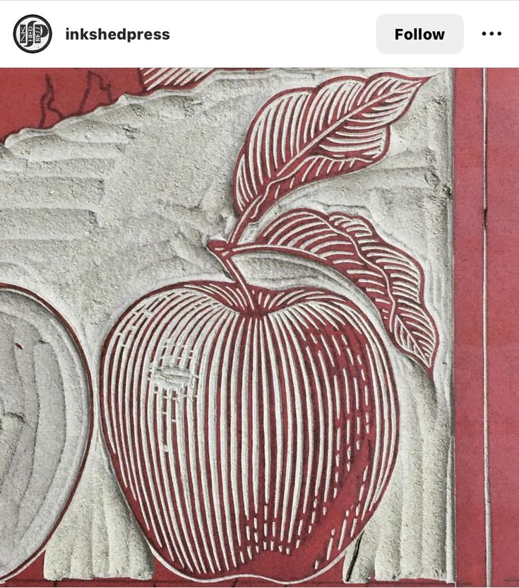 an apple is shown on the side of a red and white wallpaper with lines