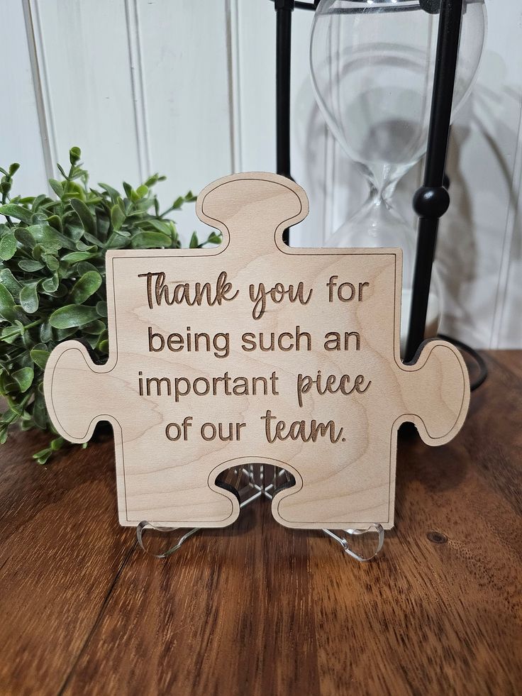 a wooden puzzle with the words thank you for being such an important piece of our team